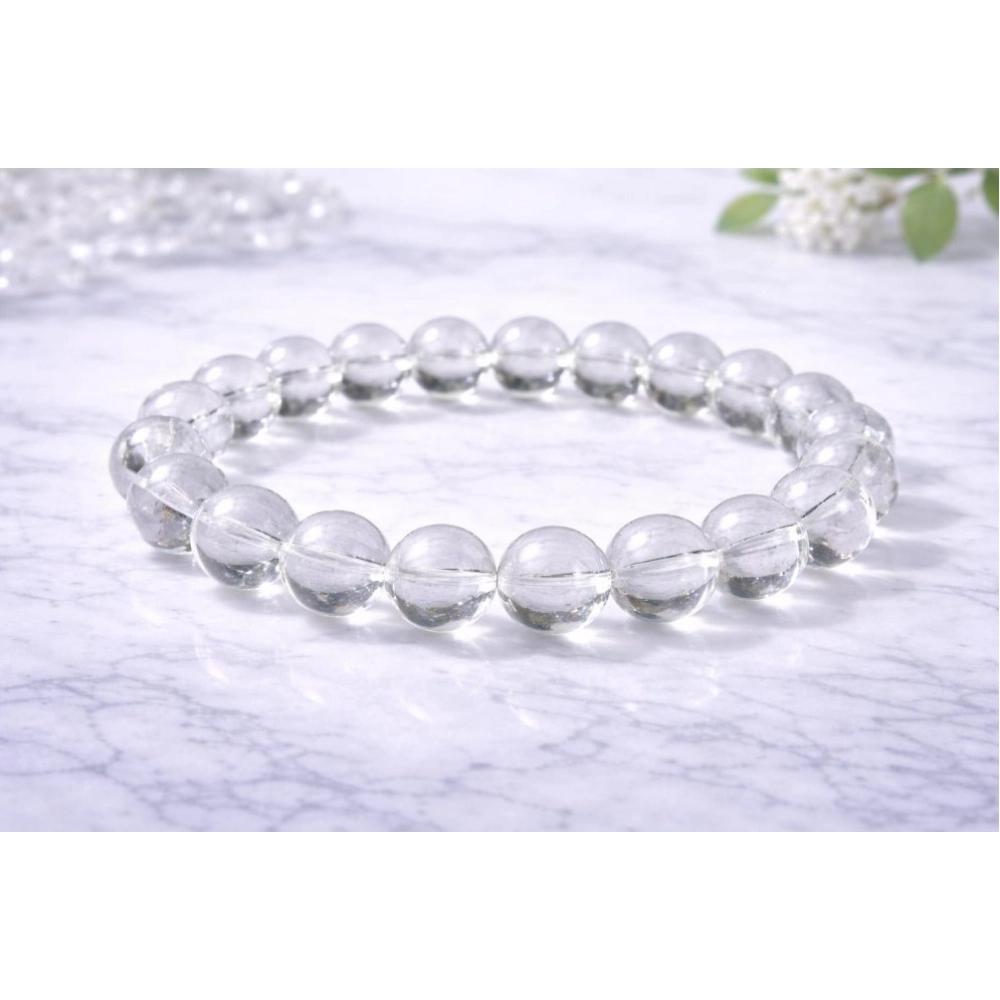 PID-64924-Natural-Crystal-8mm-Clear-Quartz-Bracelet-White-1-1000x1000-1.webp
